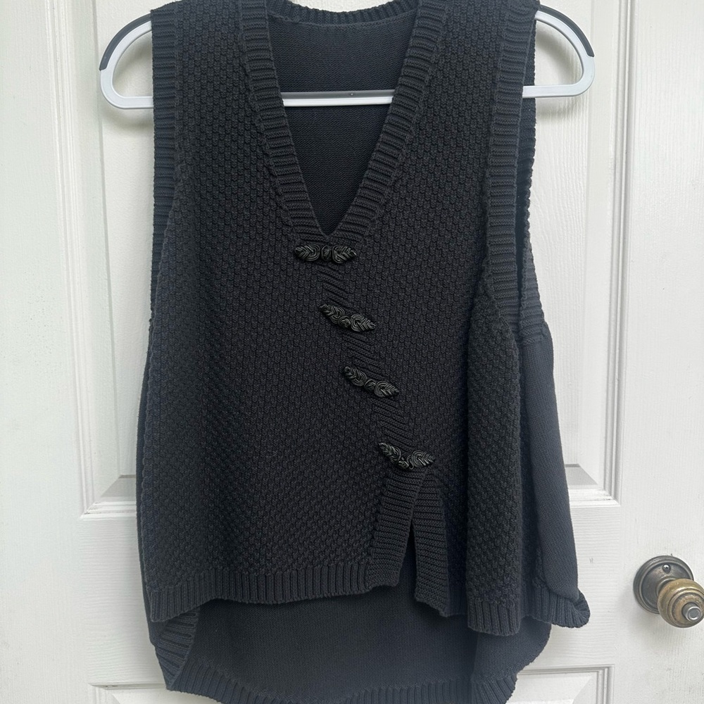 Dark Blue Sleeveless Vest with Asymmetrical Ruffle